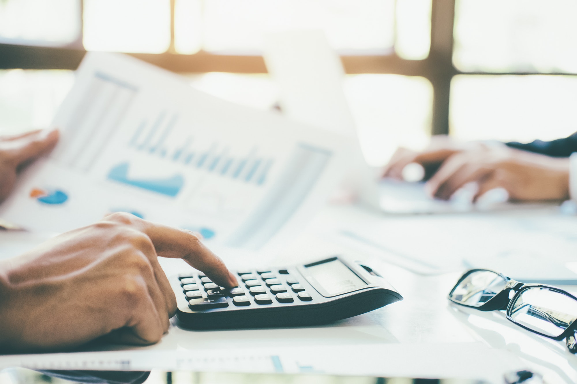 Accountant is calculate the budget. Accountant is calculate the budget.