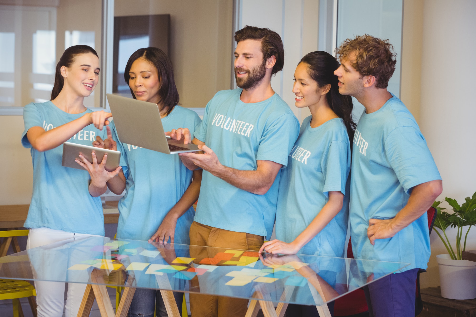 Volunteers using technology