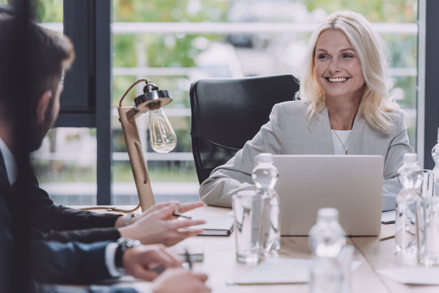 Smiling female organizational leader